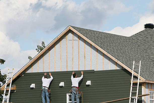 Professional Siding technician working in Miller Place, NY